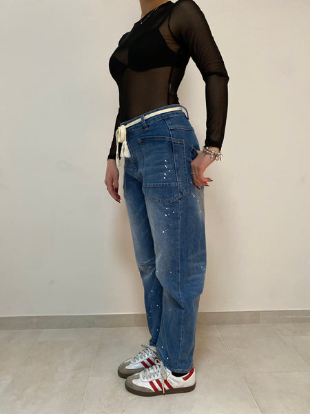Denim spruzzato stretch fitting a banana da XS a L