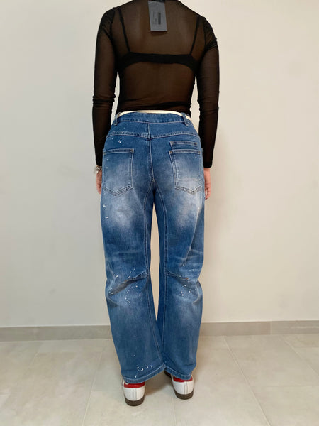 Denim spruzzato stretch fitting a banana da XS a L